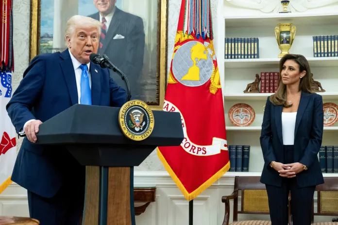 President Donald Trump and Alina Habba stand in the Oval Office.