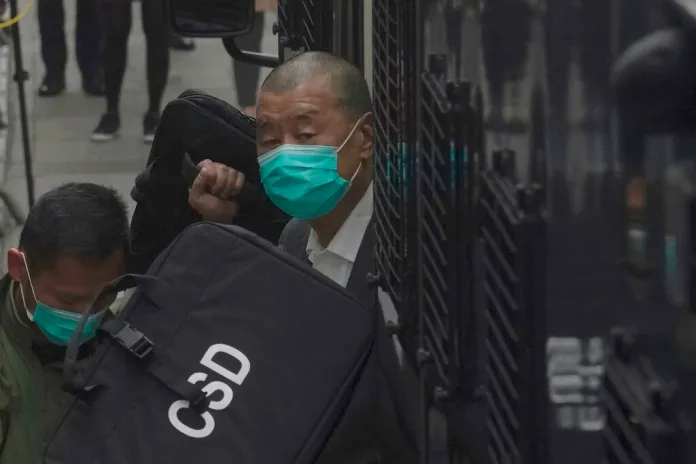 Jimmy Lai arrives at court in Hong Kong