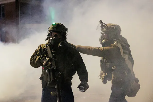 Federal agents deploy tear gas as residents protest a federal agent-involved shooting during an immigration enforcement operation in Minneapolis, Minnesota, United States on January 14, 2026. The protest comes after a federal agent-involved shooting during immigration enforcement, exactly one week after a federal agent shot and killed 37-year-old Renee Good.