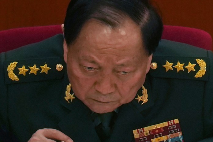Zhang Youxia listens to speeches at the National People's Congress in Beijing