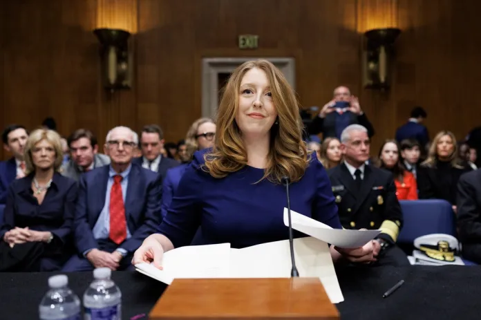 Dr. Casey Means takes her seat at the start of a Senate Health, Education Labor and Pension Committee confirmation hearing for U.S. Surgeon General on Capitol Hill Wednesday, Feb. 25, 2026