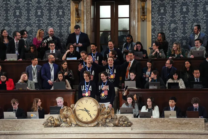 Members of the United States' Olympic hockey team attend as President Donald Trump delivers the State of the Union address to a joint session of Congress in the House chamber at the U.S. Capitol in Washington, Tuesday, Feb. 24, 2026. (AP Photo/Matt Rourke)