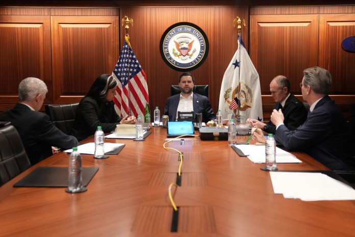 JD Vance sits at the situation room table with Cabinet members