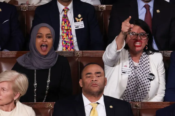 Reps. Rashida Tlaib and Ilhan Omar yell at President Donald Trump during his State of the Union address on Feb. 24, 2026. (Graeme Jennings/Washington Examiner)