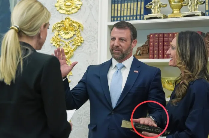 Attorney General Pam Bondi administers the oath during the swearing-in for Homeland Security Secretary Markwayne Mullin in the Oval Office of the White House, Tuesday, March 24, 2026, in Washington.