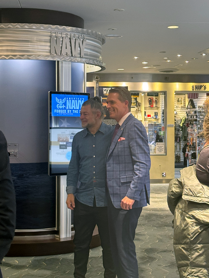 Andy Serkis (L) poses with Scott Jennings (R) after the fireside chat at Navy Memorial. (Peter Cordi/Washington Examiner)