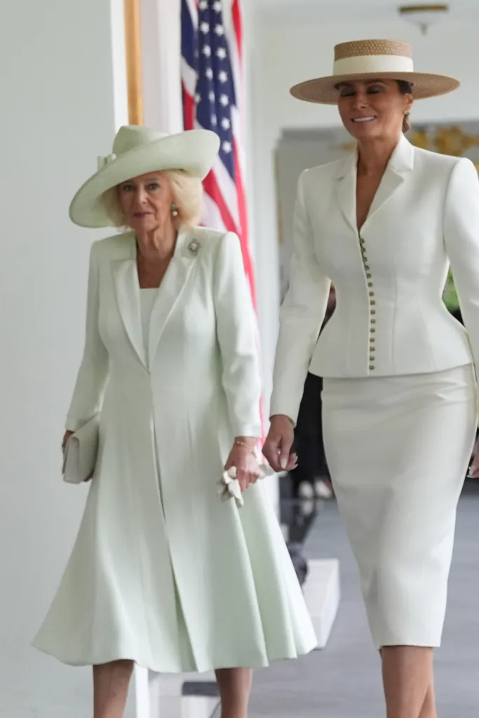 Britain's Queen Camilla walks with first lady Melania Trump.