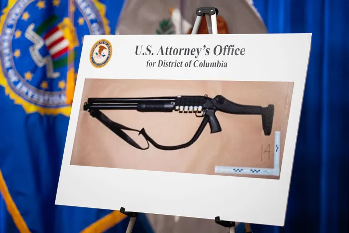 A shotgun used by Cole Tomas Allen, the White House Correspondents' Association dinner shooting suspect, is seen before Acting Attorney General Todd Blanche and others conducted a news conference at the Department of Justice, on Monday, April 27, 2026. (Tom Williams/CQ-Roll Call, Inc via Getty Images)