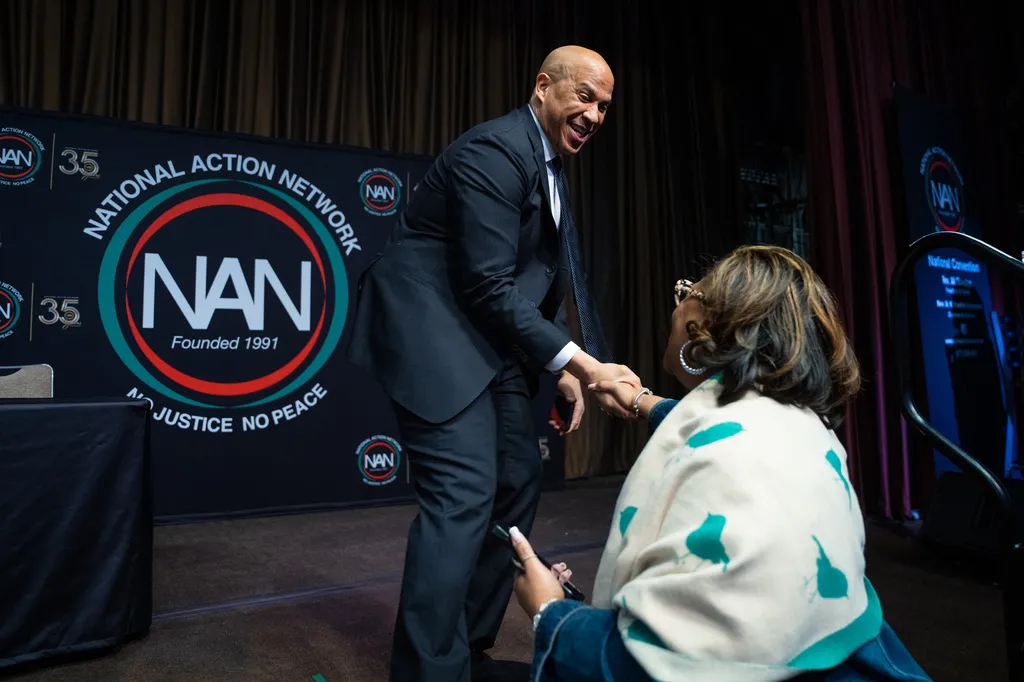 Sen. Cory Booker (D-NJ) greets a guest at the National Action Network Convention.