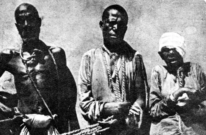 A trio of Arab-African slave traders captured by British authorities in 1892. (Hulton Archive/Getty)