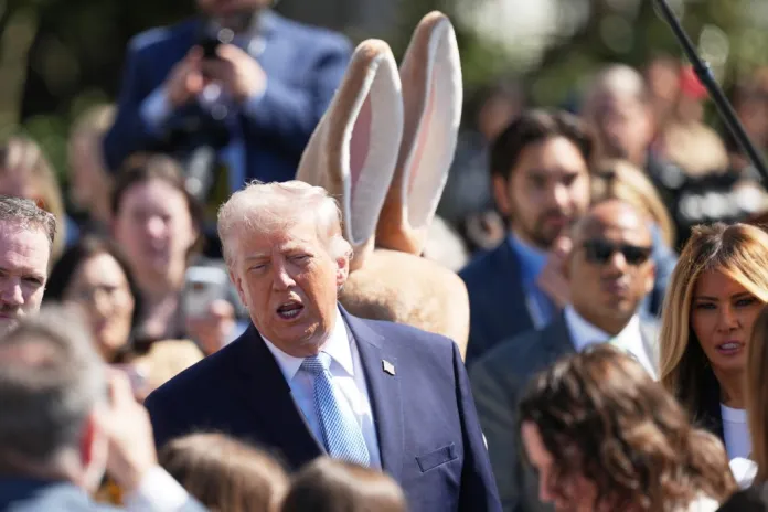President Donald Trump and first lady Melania Trump participate in the White House Easter Egg Roll on the South Lawn of the White House, Monday, April 6, 2026, in Washington. (AP Photo/Julia Demaree Nikhinson)