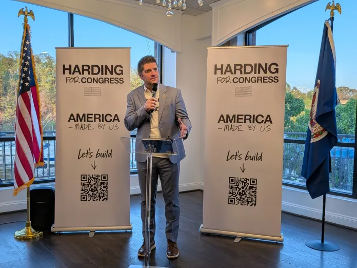 Philip Harding speaking into a microphone