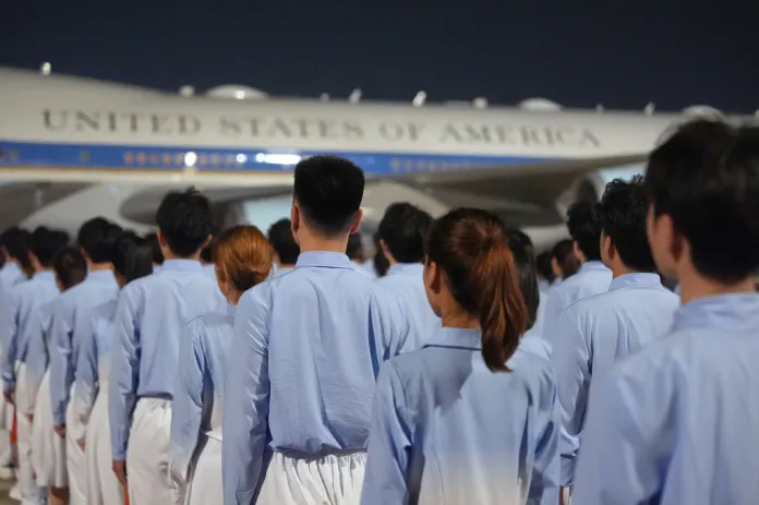 People move into place for a welcome ceremony as President Donald Trump arrives on Air Force One, Wednesday, May 13, 2026, at Beijing Capital International Airport in Beijing. (AP Photo/Mark Schiefelbein)