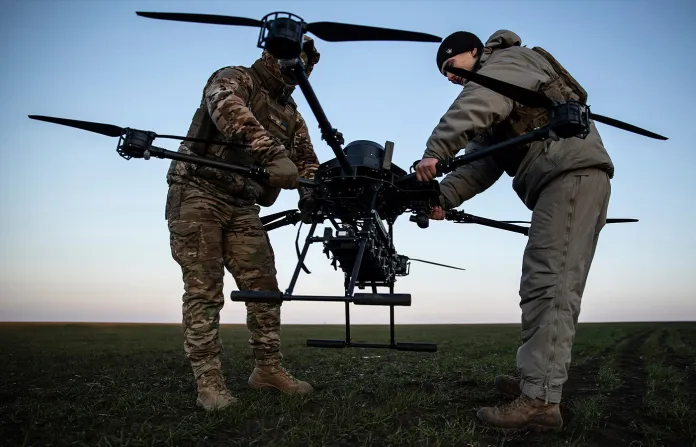 Ukrainian service members prepare a Vampire attack drone near the front line in the Donetsk region of Ukraine. (Roman Chop/AP)