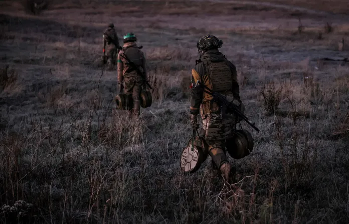 Service members of the 24th Mechanised Brigade install anti-tank landmines and nonexplosive obstacles along the front line in the Donetsk region of Ukraine. (Oleg Petrasiuk/Ukrainian 24th Mechanised Brigade via AP)