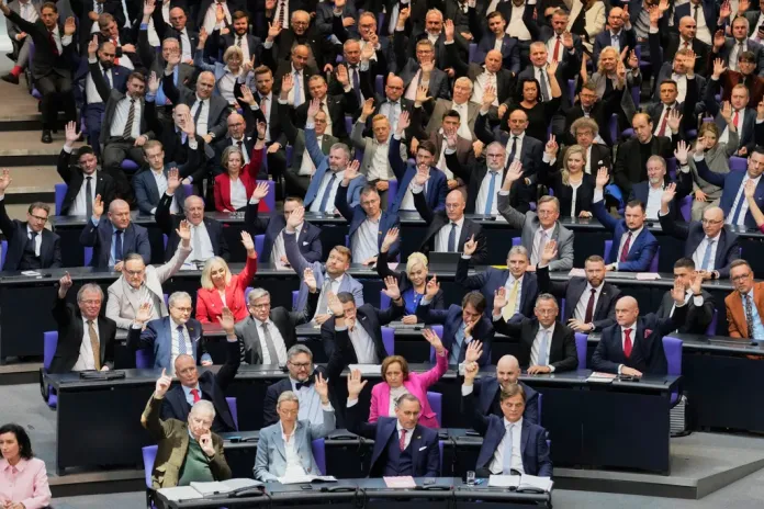 AfD members vote in the Bundestag