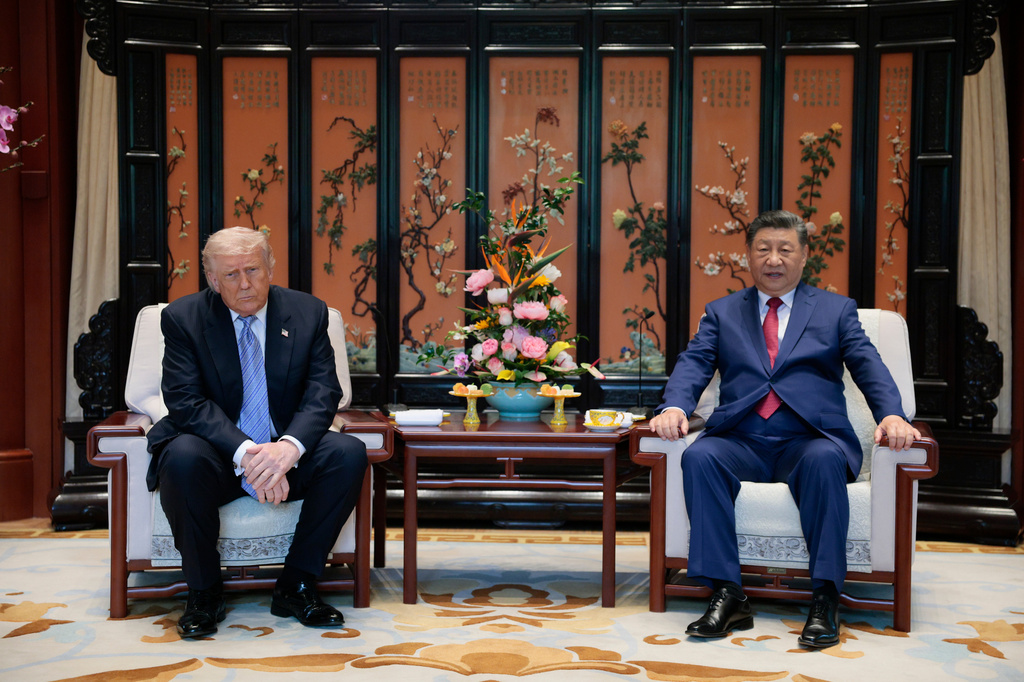 Chinese President Xi Jinping, right, and U.S. President Donald Trump attend a meeting on the sidelines of their visit to the Zhongnanhai Garden in Beijing, Friday, May 15, 2026. (Evan Vucci/Pool Photo via AP)