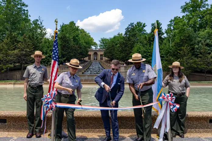 National Park Service officials cut the ribbon to re-open Meridian Hill park's fountain to the public.