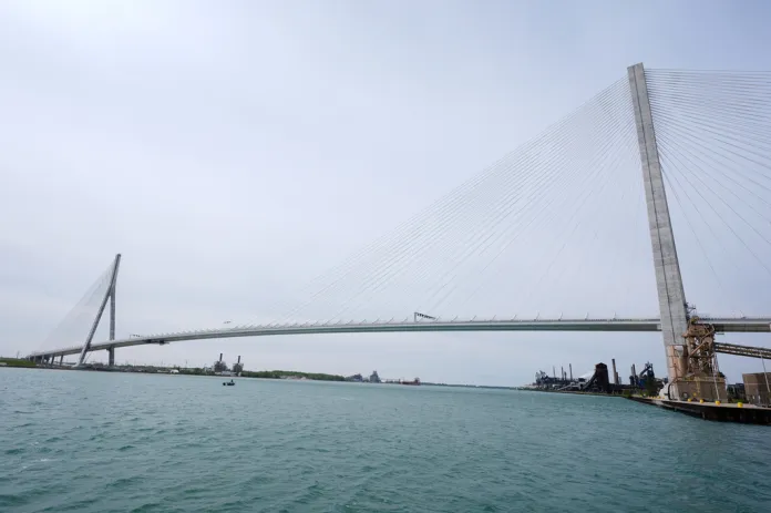 The Godie Howe Bridge is shown under construction.