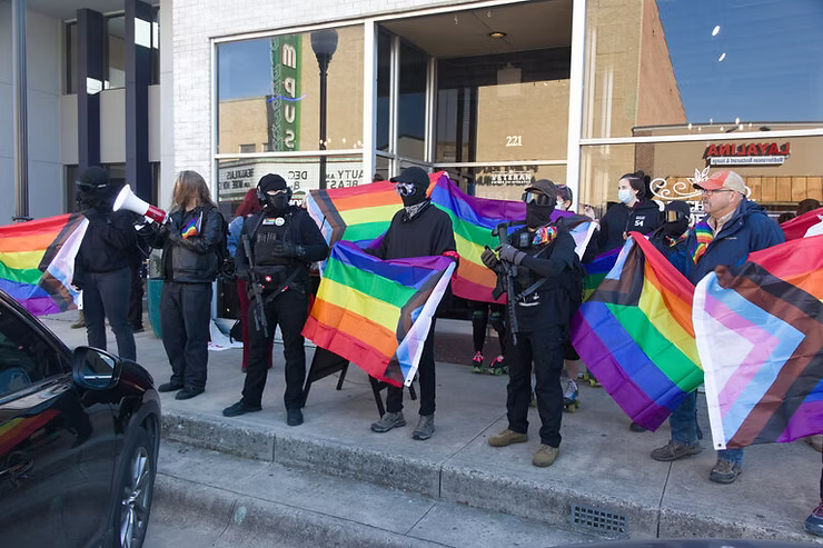 A left-wing gun club outside a transgender storytime event.