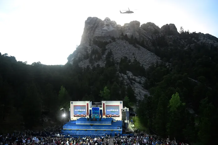 Marine One performs a flyover above Mount Rushmore National Memorial, Friday, July 3, 2026, in Keystone, S.D. 